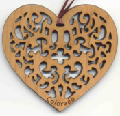 Offering custom heart Christmas ornaments.  We engrave our heart ornaments from cherry wood and personalize each unique order.