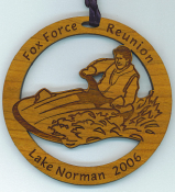 Offering custom snowmobile Christmas ornaments.  Personalized snowmobiling ornaments remind everyone of your great vacation with a memorable gift.