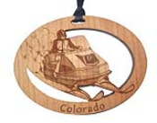 Offering custom snowmobile Christmas ornaments.  Personalized snowmobiling ornaments remind everyone of your great vacation with a memorable gift.