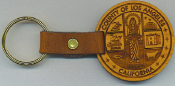 Offering wood engraved key chains for as low as $1.40 each.  Laser engraved logos, art work, messages in many sizes and shapes.