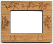 Offering custom personalized picture frames.  We have many custom designs and can engrave your names, dates, and resort locations on the bottom or top of the frame.