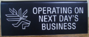 Operating on Next Day's Business Sign