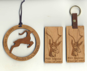 Offering custom mascot Christmas ornaments. Our custom made magnets and specialty key chains make unique Christmas gifts using a school or team mascot.