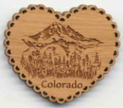Offering custom mountain magnets. Our laser engraved cherry wood magnet favors make unique gifts and mementos.