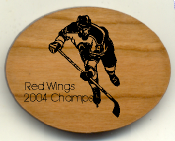 Offering custom made hockey magnets.  Our personalized magnet is engraved from cherry wood from scratch and makes a unique favor or gift for hockey teams.