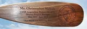 Offers custom engraved canoe paddles at rates starting for as low as $26.00 in volume