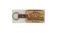 Offering custom mountain wooden key fobs.  Personalized specialty key chains and key fobs make unique promotional products and favors for special occasions.